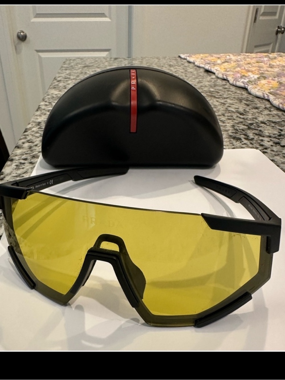 Prada Black Frame Sunglasses with Yellow Lens